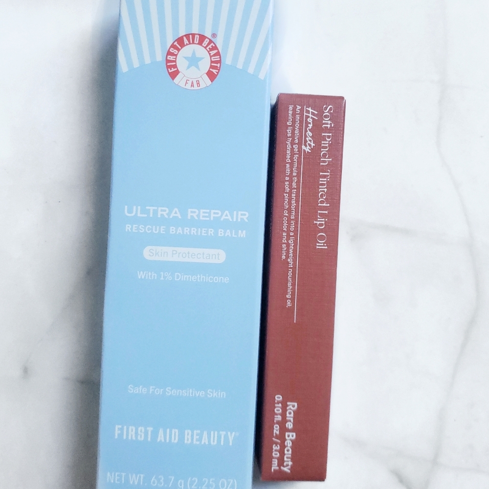 First Aid Beauty Rescue Barrier Balm And Rare Beauty Lip Oil In Honestly
